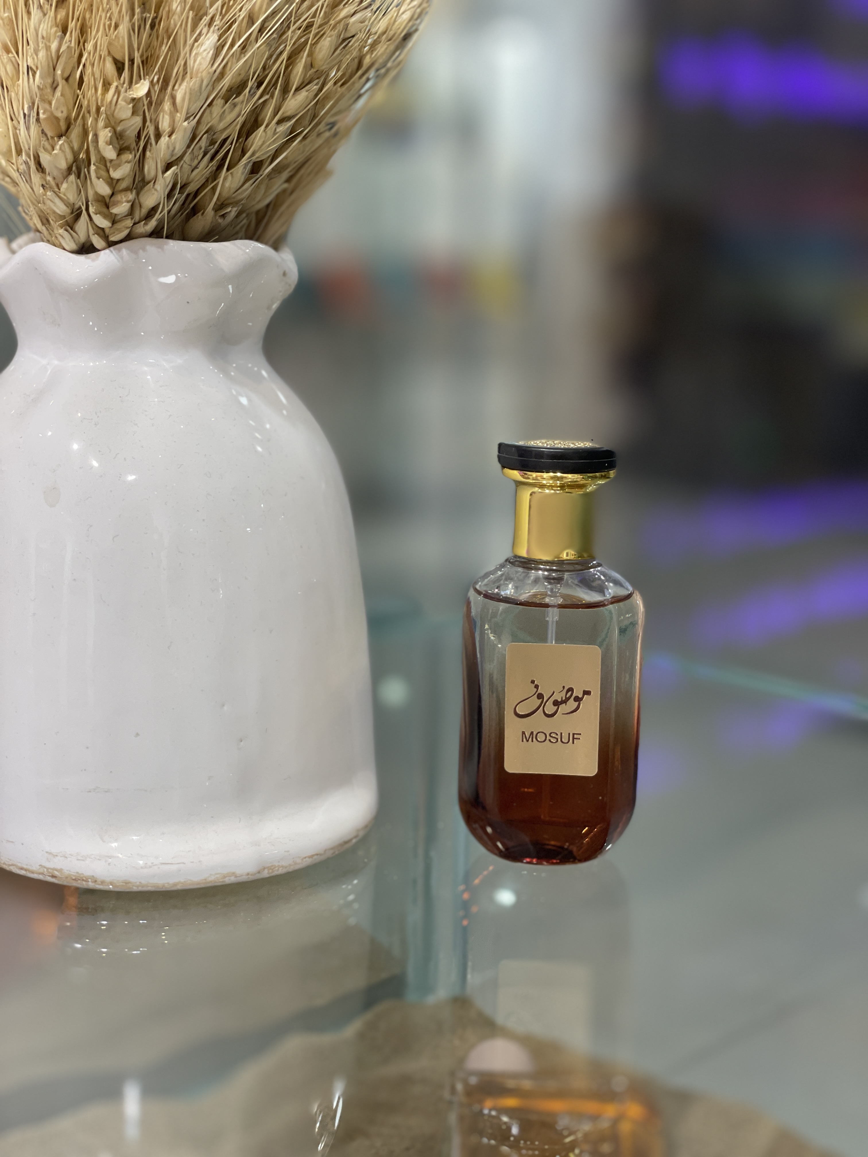 عطر مردانه موصوف قهوه ای ارض زعفران